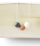 Essential Oil Diffuser Necklace - Ebony, Pink and White Wood